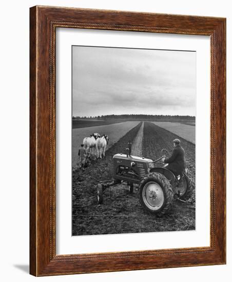 French Farmer Georges Raoul Fremond Trying Out His New Massey-Harris Tractor Obtained Through Eca-null-Framed Photographic Print