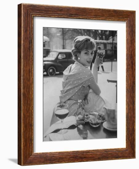 French Fashion Model Marie Helene Arnaud Sitting at a Cafe-Loomis Dean-Framed Photographic Print