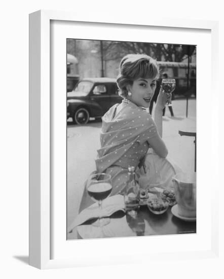 French Fashion Model Marie Helene Arnaud Sitting at a Cafe-Loomis Dean-Framed Photographic Print