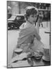 French Fashion Model Marie Helene Arnaud Sitting at a Cafe-Loomis Dean-Mounted Photographic Print