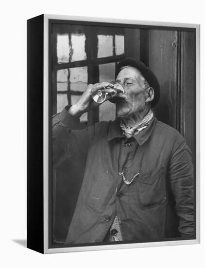 French Man Drinking a Glass of Wine-null-Framed Premier Image Canvas