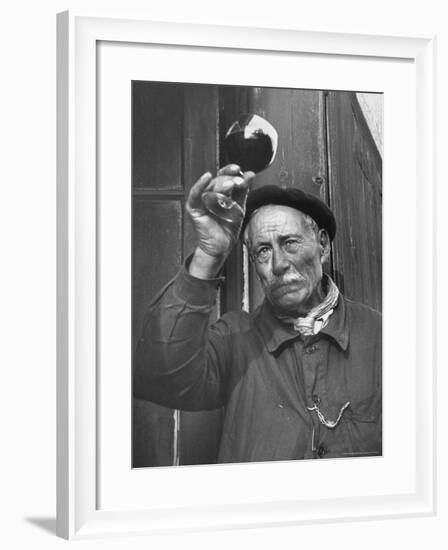 French Man Looking at How Clear the Wine Is-Thomas D^ Mcavoy-Framed Photographic Print