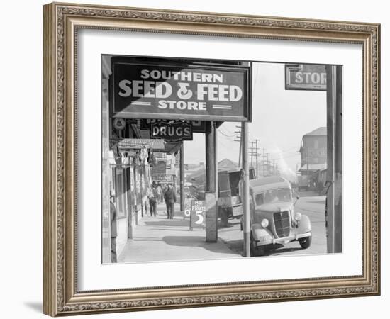 French market sidewalk scene at the Waterfront in New Orleans, Louisiana, 1935-Walker Evans-Framed Photographic Print