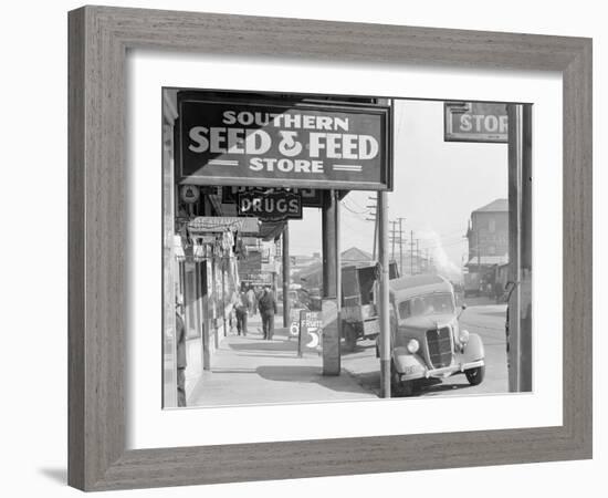 French market sidewalk scene at the Waterfront in New Orleans, Louisiana, 1935-Walker Evans-Framed Photographic Print