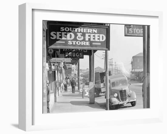 French market sidewalk scene at the Waterfront in New Orleans, Louisiana, 1935-Walker Evans-Framed Photographic Print