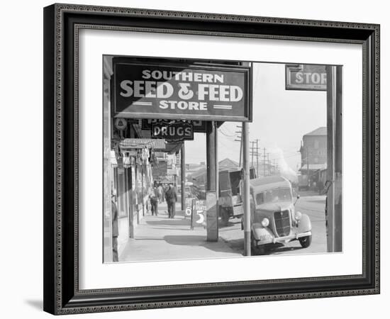 French market sidewalk scene at the Waterfront in New Orleans, Louisiana, 1935-Walker Evans-Framed Photographic Print