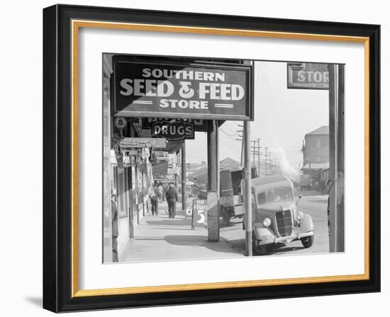 French market sidewalk scene at the Waterfront in New Orleans, Louisiana, 1935-Walker Evans-Framed Photographic Print