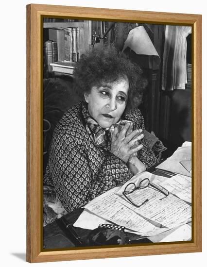 French Novelist Colette, at Desk Covered with Handwritten Notes Topped by Reading Glasses at Home-David Scherman-Framed Premier Image Canvas