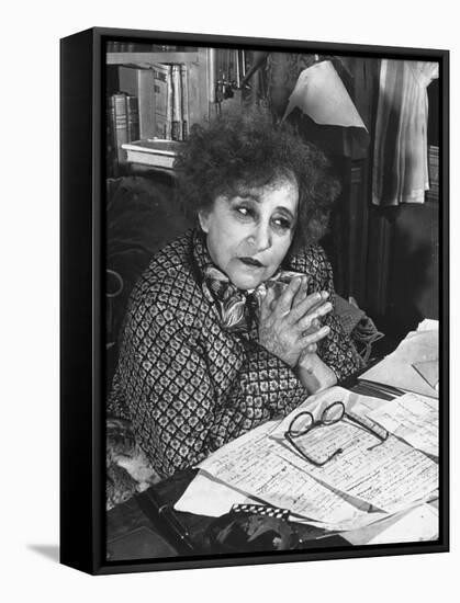 French Novelist Colette, at Desk Covered with Handwritten Notes Topped by Reading Glasses at Home-David Scherman-Framed Premier Image Canvas