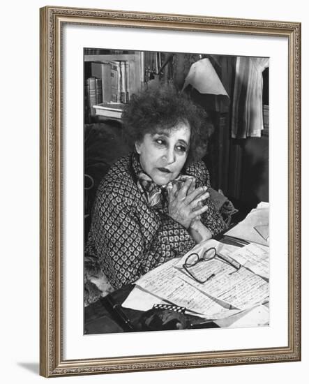 French Novelist Colette, at Desk Covered with Handwritten Notes Topped by Reading Glasses at Home-David Scherman-Framed Premium Photographic Print