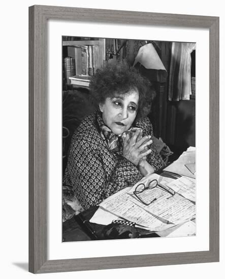 French Novelist Colette, at Desk Covered with Handwritten Notes Topped by Reading Glasses at Home-David Scherman-Framed Premium Photographic Print