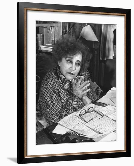 French Novelist Colette, at Desk Covered with Handwritten Notes Topped by Reading Glasses at Home-David Scherman-Framed Premium Photographic Print