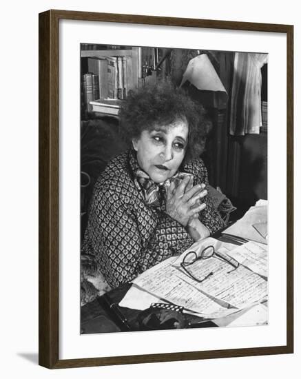 French Novelist Colette, at Desk Covered with Handwritten Notes Topped by Reading Glasses at Home-David Scherman-Framed Premium Photographic Print