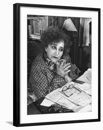 French Novelist Colette, at Desk Covered with Handwritten Notes Topped by Reading Glasses at Home-David Scherman-Framed Premium Photographic Print