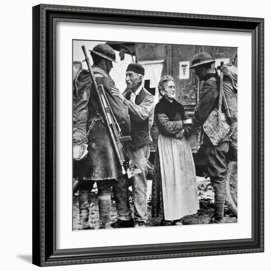 French Peasants Greet Two Heavily-Laden Americans, 1917-American Photographer-Framed Photographic Print