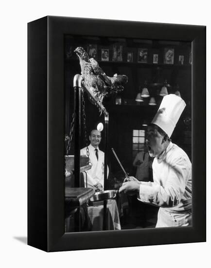 French Restaurant Owner Sam Letrone Entertaining Patrons with His Performing Chicken-Loomis Dean-Framed Premier Image Canvas