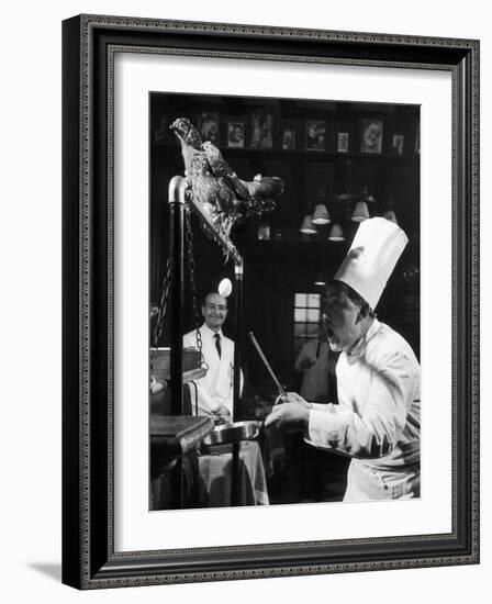 French Restaurant Owner Sam Letrone Entertaining Patrons with His Performing Chicken-Loomis Dean-Framed Photographic Print