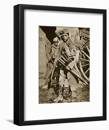 French soldier with wooden crosses to be placed on temporary graves, World War I, c1914-c1918-Unknown-Framed Photographic Print