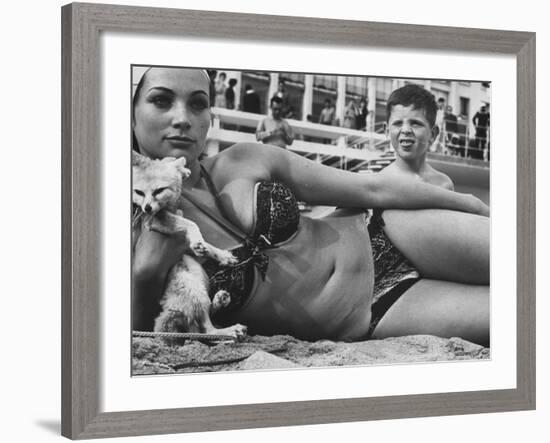 French Starlet Philomene Toulouse Angling Attention with Pet Fox and Bare Torso-Paul Schutzer-Framed Premium Photographic Print