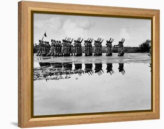 French Troops, Evacuating Hanoi, Mirrored in a Puddle as They Pass in Final Dress Review-Howard Sochurek-Framed Premier Image Canvas