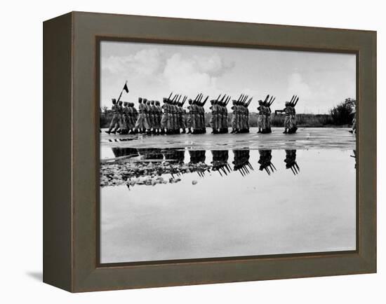 French Troops, Evacuating Hanoi, Mirrored in a Puddle as They Pass in Final Dress Review-Howard Sochurek-Framed Premier Image Canvas