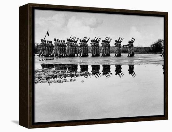 French Troops, Evacuating Hanoi, Mirrored in a Puddle as They Pass in Final Dress Review-Howard Sochurek-Framed Premier Image Canvas