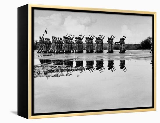 French Troops, Evacuating Hanoi, Mirrored in a Puddle as They Pass in Final Dress Review-Howard Sochurek-Framed Premier Image Canvas