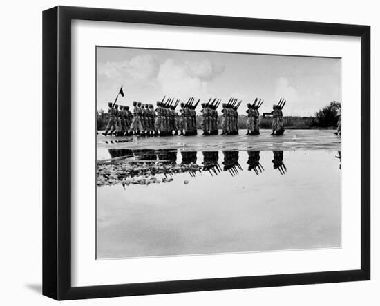 French Troops, Evacuating Hanoi, Mirrored in a Puddle as They Pass in Final Dress Review-Howard Sochurek-Framed Photographic Print