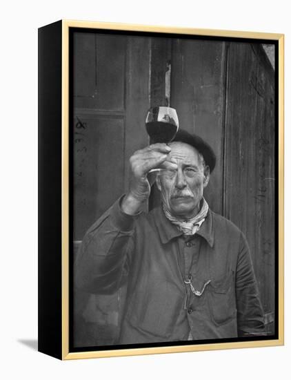 French Vintner Showing the Proper Wine Tasting Technique-Thomas D^ Mcavoy-Framed Premier Image Canvas