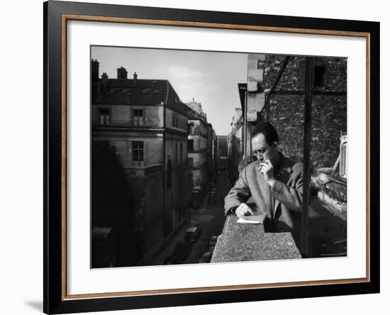 French Writer Albert Camus Smoking Cigarette on Balcony Outside His Publishing Firm Office-Loomis Dean-Framed Premium Photographic Print