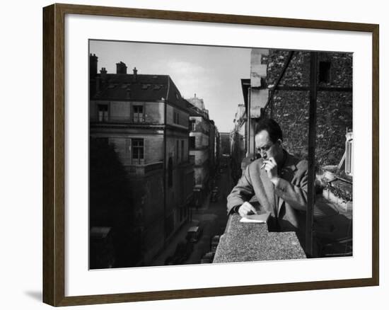 French Writer Albert Camus Smoking Cigarette on Balcony Outside His Publishing Firm Office-Loomis Dean-Framed Premium Photographic Print