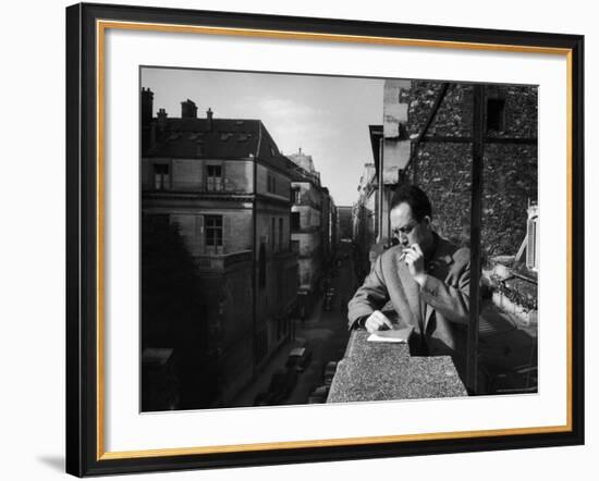 French Writer Albert Camus Smoking Cigarette on Balcony Outside His Publishing Firm Office-Loomis Dean-Framed Premium Photographic Print