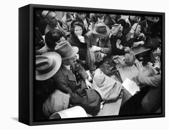 Frenzied Shoppers Crowd around Busy Cashier During Hearn's Department Stores Bargain Rush Sale-Lisa Larsen-Framed Premier Image Canvas