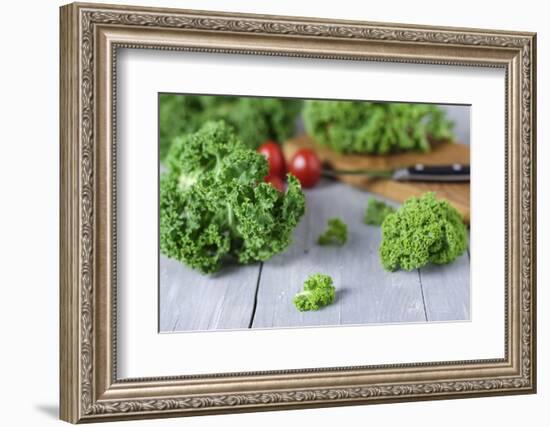 Fresh Curly Cale and Tomatoes on Grey Wooden Table-Jana Ihle-Framed Photographic Print