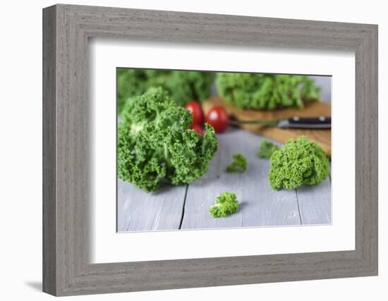 Fresh Curly Cale and Tomatoes on Grey Wooden Table-Jana Ihle-Framed Photographic Print