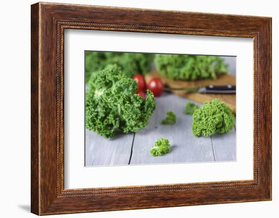 Fresh Curly Cale and Tomatoes on Grey Wooden Table-Jana Ihle-Framed Photographic Print