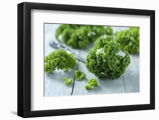 Fresh Curly Cale on Grey Wooden Table-Jana Ihle-Framed Photographic Print