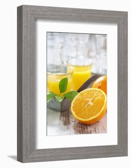 Fresh Pressed Orange Juice and Oranges-Jana Ihle-Framed Photographic Print