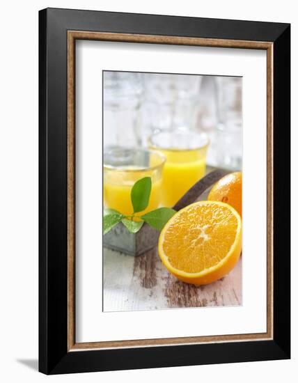 Fresh Pressed Orange Juice and Oranges-Jana Ihle-Framed Photographic Print