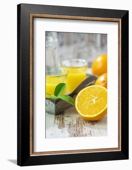 Fresh Pressed Orange Juice and Oranges-Jana Ihle-Framed Photographic Print