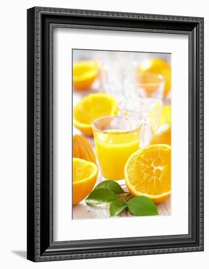 Fresh Pressed Orange Juice and Oranges-Jana Ihle-Framed Photographic Print