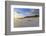 Fresh Spring Snow at Dawn Highlight Ripples and Marks in the Sand Beneath Bamburgh Castle-Eleanor-Framed Photographic Print