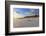 Fresh Spring Snow at Dawn Highlight Ripples and Marks in the Sand Beneath Bamburgh Castle-Eleanor-Framed Photographic Print