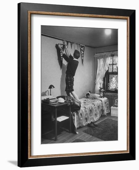 Freshman Mary Lloyd-Rees Hanging Both Harvard and Yale Banners in Her Room-Lisa Larsen-Framed Photographic Print