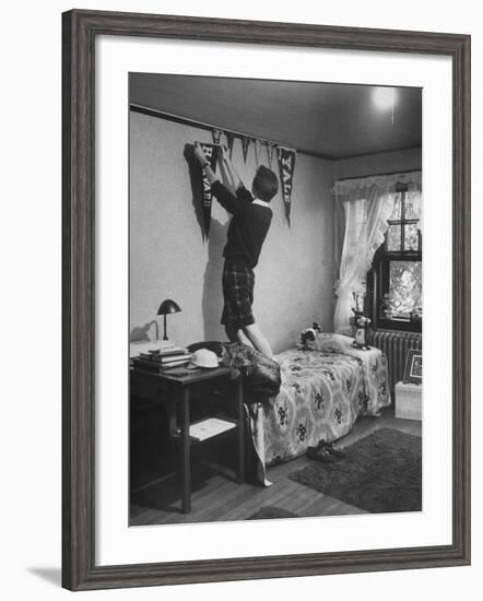 Freshman Mary Lloyd-Rees Hanging Both Harvard and Yale Banners in Her Room-Lisa Larsen-Framed Photographic Print