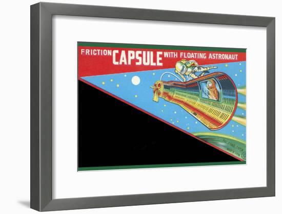 Friction Capsule with Floating Astronaut-null-Framed Art Print