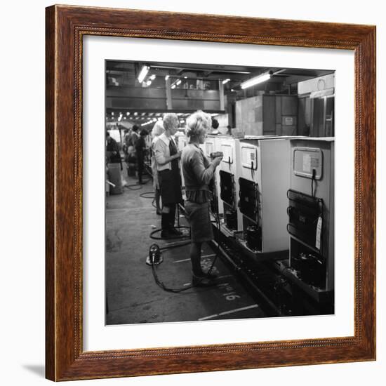 Fridge Assembly Line at the General Electric Company, Swinton, South Yorkshire, 1964-Michael Walters-Framed Photographic Print