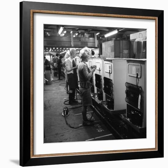 Fridge Assembly Line at the General Electric Company, Swinton, South Yorkshire, 1964-Michael Walters-Framed Photographic Print