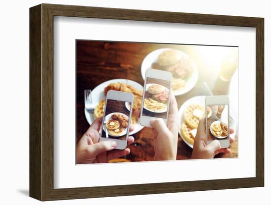 Friends Using Smartphones to Take Photos of Food with Instagram Style Filter-evren_photos-Framed Photographic Print