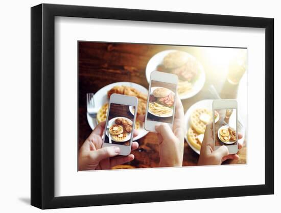 Friends Using Smartphones to Take Photos of Food with Instagram Style Filter-evren_photos-Framed Photographic Print